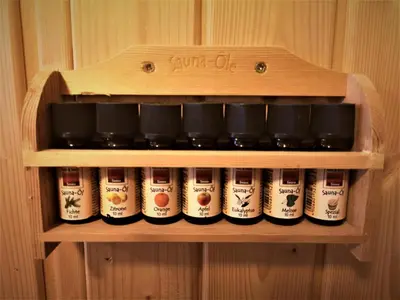 a wooden shelf filled with jars of food at Apartment Hanspaulka Garden in Prague