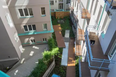 an overhead view of a courtyard between two buildings at Stay in heart of town in Prague