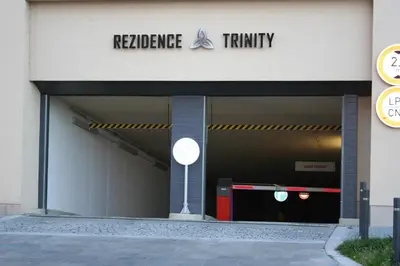 a building with the entrance to a train station at Karlín Apartment in Prague