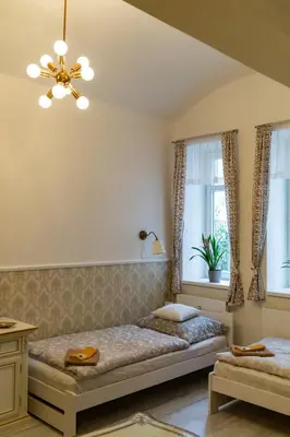a bedroom with a bed and a window at Studio near Congress Centre II. in Prague