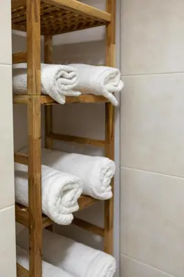a bunch of towels on a towel rack in a bathroom at SlaBur Residence in Prague