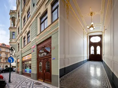 a staircase with a green railing and a window at Old Town - Dusni Apartments in Prague