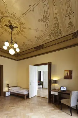 a bathroom with a sink and a mirror and a shower at Old Town - Dusni Apartments in Prague