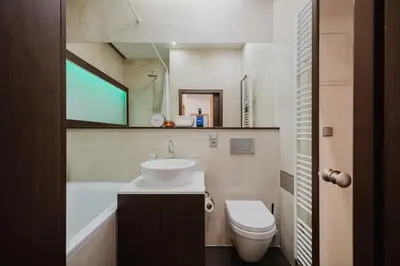 a bathroom with a sink and a toilet at Prague Days - Open-plan Apartment with Netflix in Žižkov in Prague