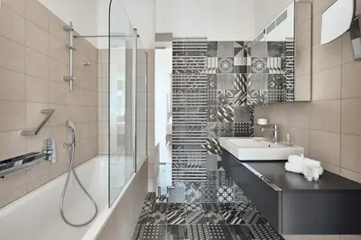a bathroom with a sink and a shower at High Heaven in Prague