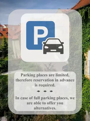 a sign that says parking places are limited therefore reservation in advance is required at Hotel At the Green Grape in Prague