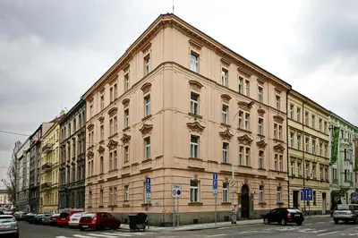 a large building with cars parked in front of it at Luxury Center Apt. Charles bridge walking distance in Prague