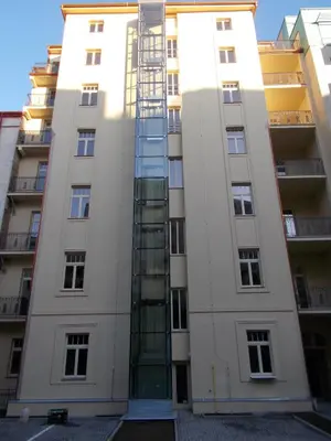 a ladder on the side of a building at Andel Centre SPIRIT in Prague