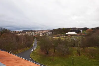 a view of a road with a city in the background at Císařka Apartments in Prague