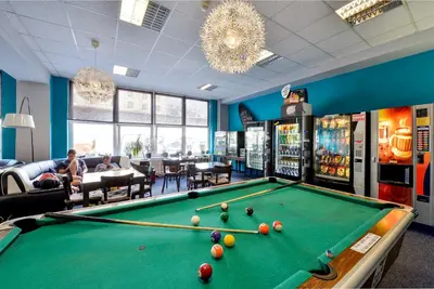 a billiard room with a pool table at Plus Prague in Prague