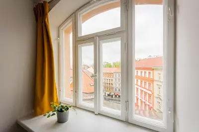a bathroom with a sink and a shower at Self-service Hotel Ostaš Praha in Prague