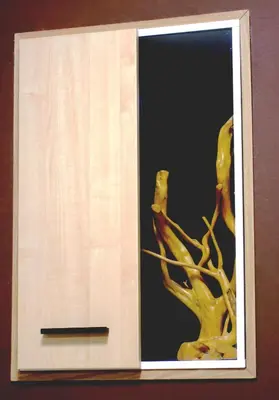 a glass window with a wooden frame with a tree at Rezidence Jiskra in Brandýs nad Labem-Stará Boleslav
