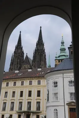 a view of a building from an archway at Karlova Apartment in Prague