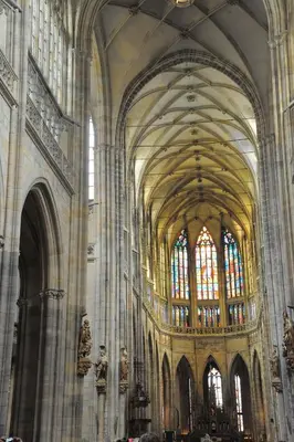 a large cathedral with a large ceilings and stained glass windows at Karlova Apartment in Prague