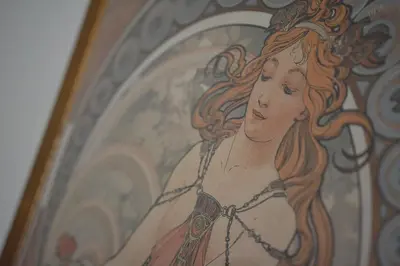 a painting of a woman with a crown on her head at Apartment in the heart of Prague in Prague