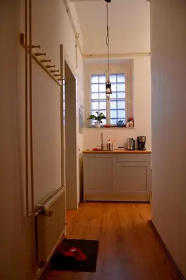 a kitchen with a counter and a sink and a window at Old Town Basement in Prague