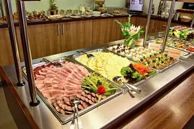 a buffet line with many different types of food at Hotel DAP in Prague