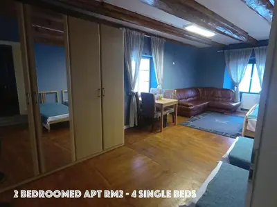 a living room with a couch and a table at DN Pub Apartments in Prague