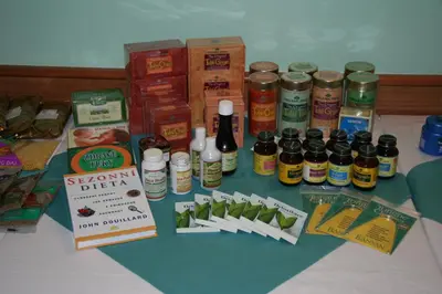 a table with a bunch of bottles of essential oils at Lazensky Hotel Park in Poděbrady