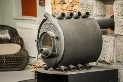 a mixer sitting on top of a stove at Luxusní srub Líny in Bukovno