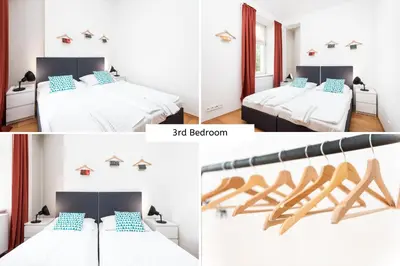 a bedroom with two beds and a bedroom at Rehorova apartments by Pragueforyou in Prague