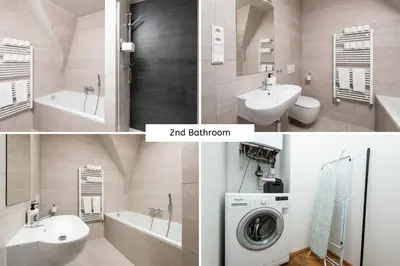 a bathroom with a toilet sink and a washing machine at Rehorova apartments by Pragueforyou in Prague