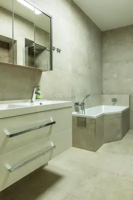 a bathroom with a sink and a tub and a mirror at Exclusive 3 Bedroom Top-Notch Flat, GREAT LOCATION in Prague