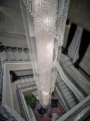 a large chandelier hanging from the ceiling of a building at PALOMA Průhonice in Pruhonice