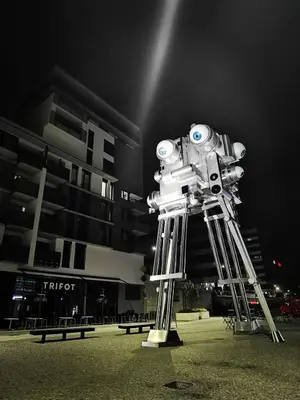 a robot is standing in front of a building at Nice and refreshing flat in Prague in Prague