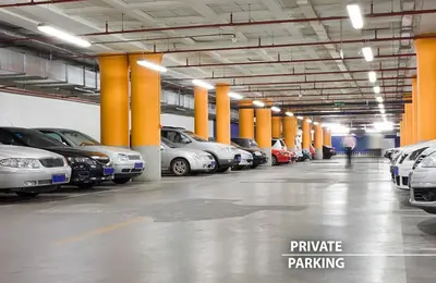 a parking garage filled with lots of parked cars at Josephine Old Town Square Hotel - Czech Leading Hotels in Prague
