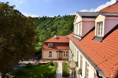 an overhead view of a house with red roofs at Castle Residence Praha in Prague