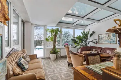 a living room with a couch and a table at White House in Prague
