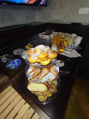 a bunch of different types of pastries on a table at Rezidence Liběchov in Liběchov