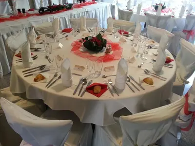 a long table with white tables and white chairs at Alt pension in Prague