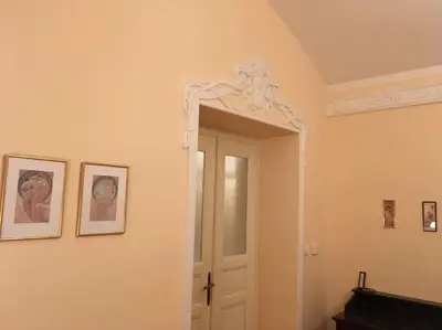 a room with a door and a mirror at Zderaz in Prague