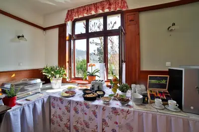 a table with food on it in a room at Penzion Karlštejn in Karlštejn