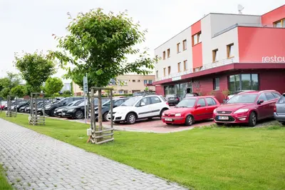 a bunch of cars parked in a parking lot at Hotel Lifestyle in Prague