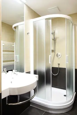 a bathroom with a shower and a sink at Hotel Lifestyle in Prague
