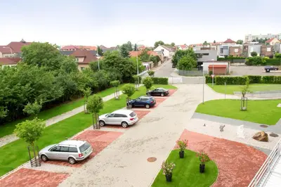 an aerial view of cars parked in a parking lot at Hotel Lifestyle in Prague