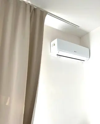 a room with a shower curtain and a speaker at Maria Apartments - Free Parking in Prague
