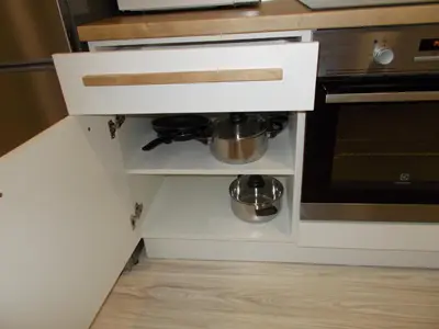a kitchen cabinet with two pots and a stove at Neklanova Apartments in Prague