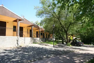 a house with a car parked in front of it at Resort Beach Nová Živohošť in Křečovice