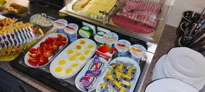 a buffet with many different types of food at Pension PRIMUS in Beroun