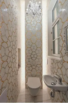 a bathroom with a toilet and a sink at Vogue apartment near by Wenceslas Square in Prague