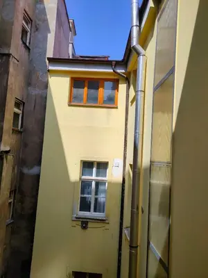 an overhead view of a building with a window at Vogue apartment near by Wenceslas Square in Prague