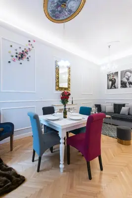a dining room with a table and chairs at Vogue apartment near by Wenceslas Square in Prague