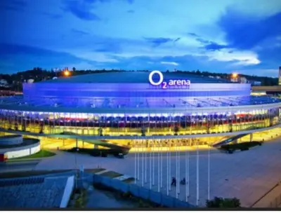 a large building is lit up at night at The SUNNY PRAGUE APPARTMENT&Garage in Prague