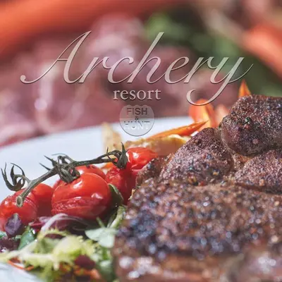 a plate of food with tomatoes and other foods at Penzion Archery in Nová Ves