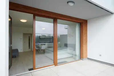 an external view of a room with sliding glass doors at Residence Nad Vltavou in Prague