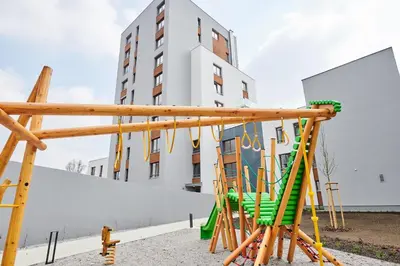 a playground in front of a building at Residence Nad Vltavou in Prague